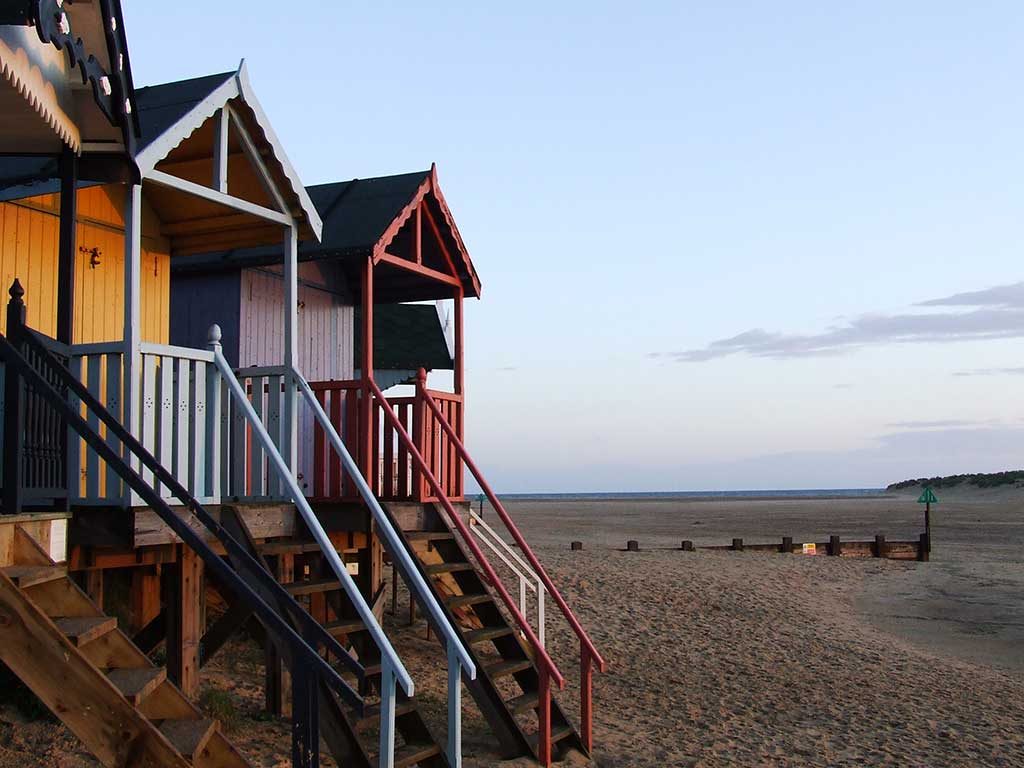 Colourful beach huts